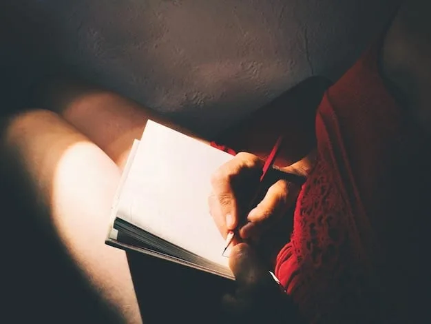 A close-up image of a hand writing in a journal, with a pen resting on paper. The journal is open to a page with bullet points and keywords like