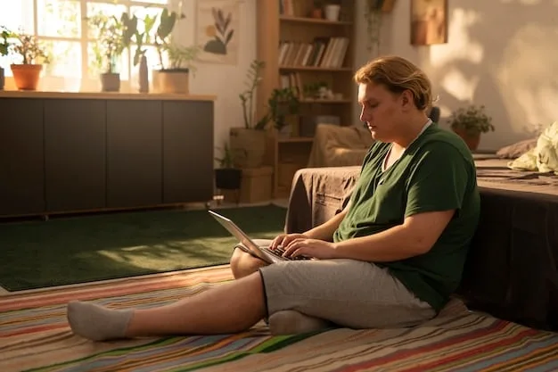 A person sitting comfortably on their couch, participating in a teletherapy session on a laptop. The setting is a warm and inviting living room.