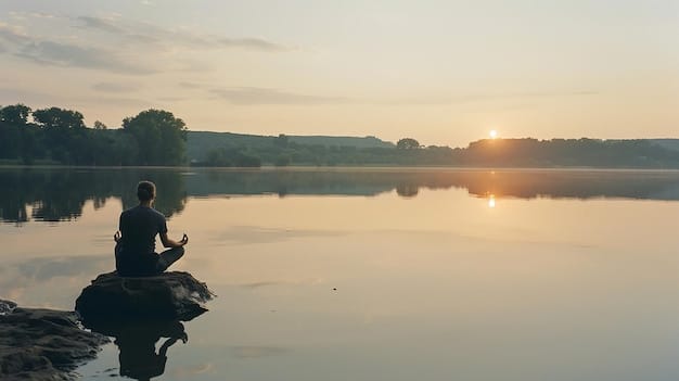 A person meditating by a calm lake at sunrise, representing peace, mindfulness, and the practice of self-reflection.