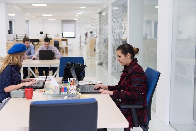 An open-plan office with large windows, adjustable workstations, and employees using blue-light filtering glasses while working on their computers. The lighting is warm and natural, creating a calming and productive atmosphere.