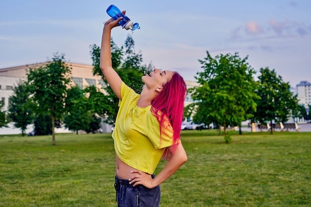 A person holding a water bottle, pouring water over their head, with a shaded park in the background. The image illustrates the importance of hydration and seeking cool environments during a heat wave.